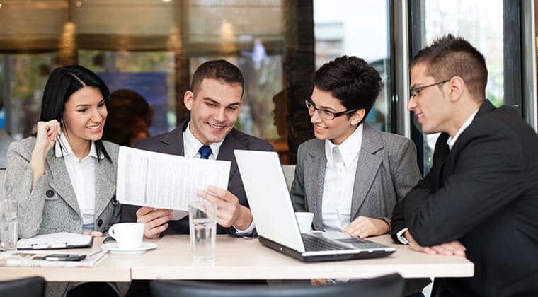 colleagues discussing outsourced managed IT services