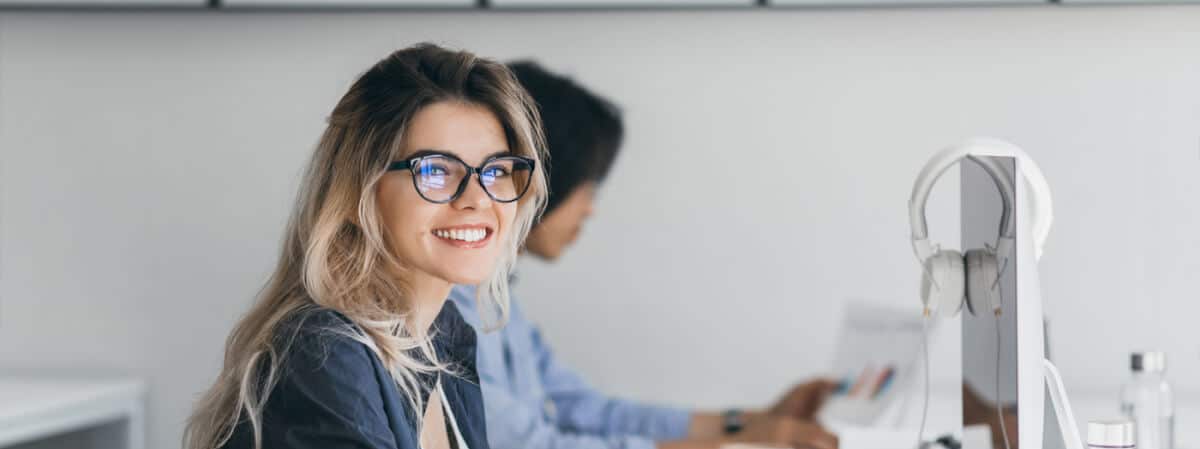 Smiling IT employee.